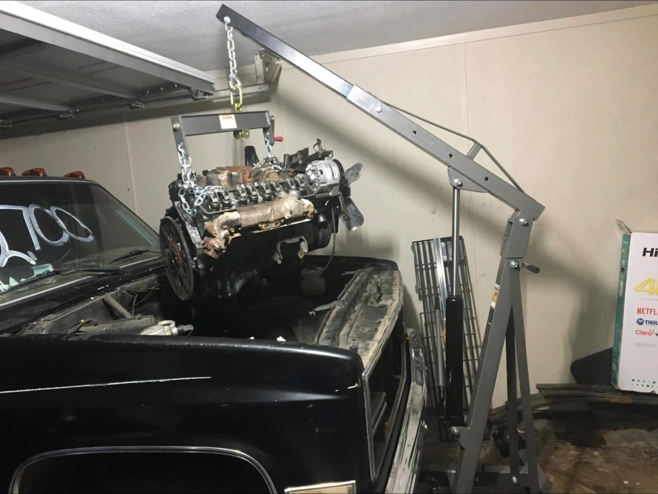 Engine removal work in a garage