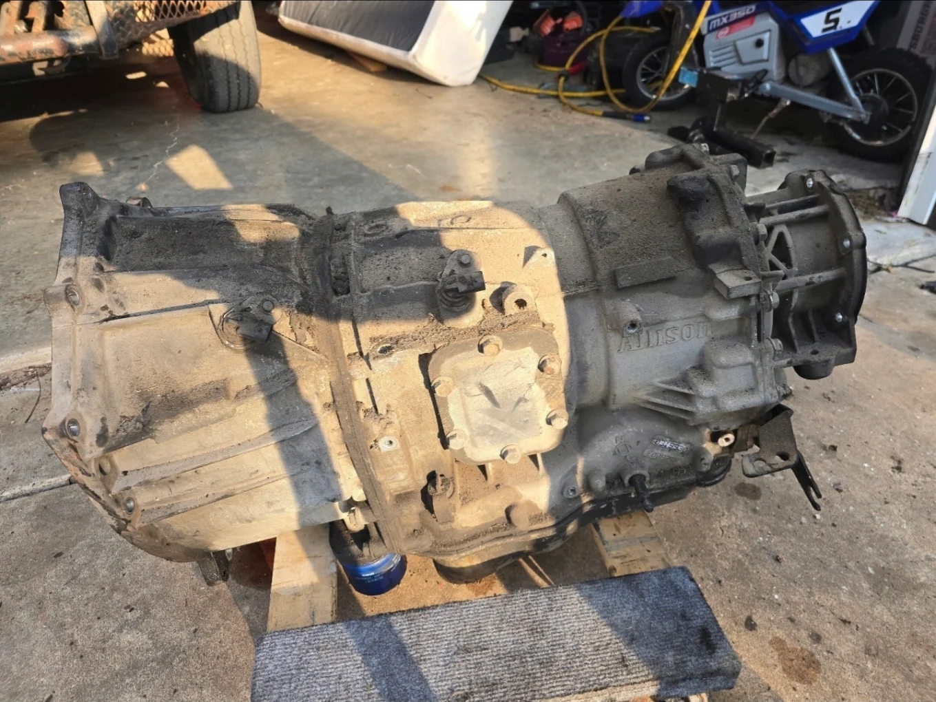 Transmission assembly on the ground during service